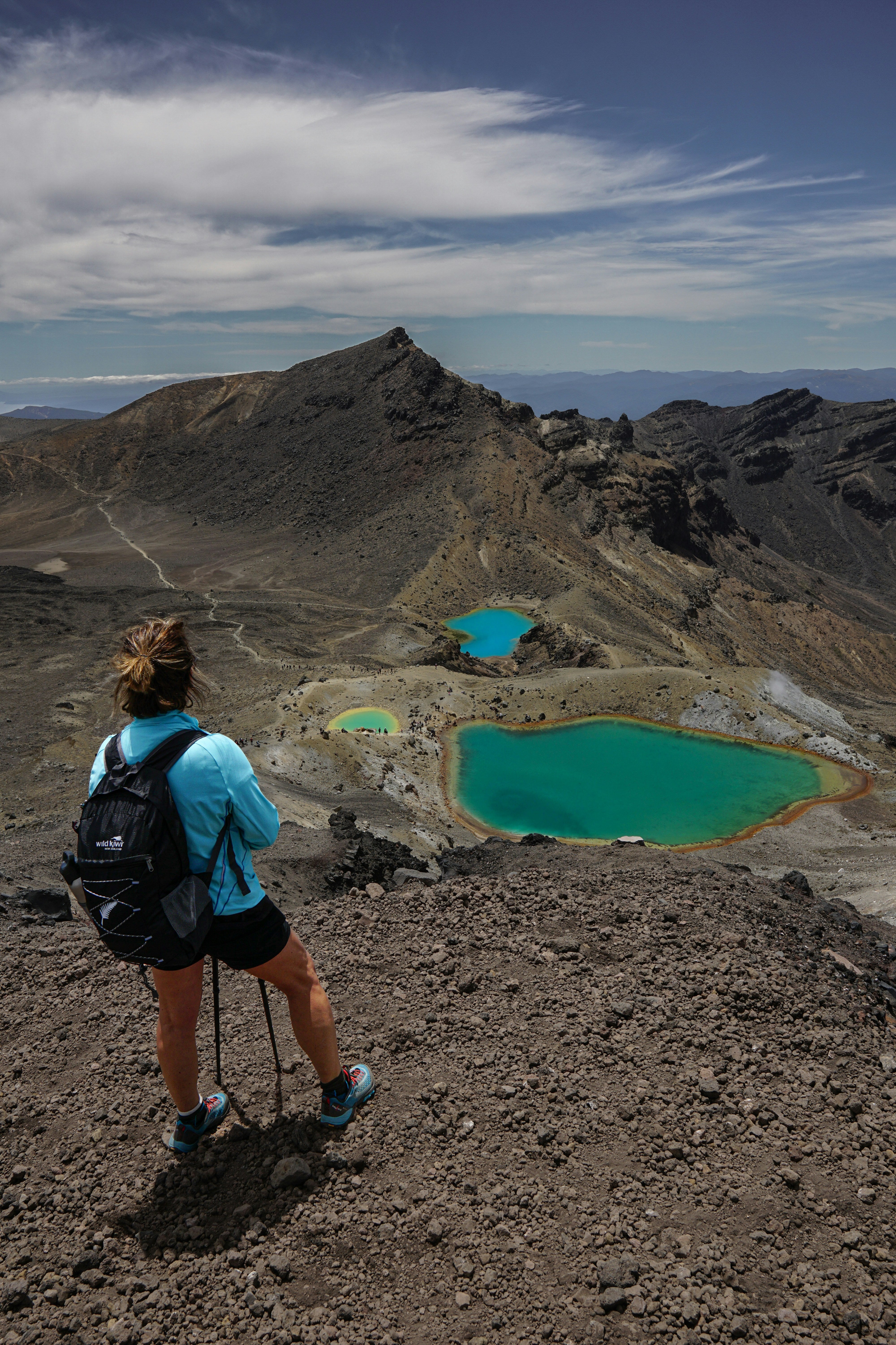 Hiker overlooking the Emerald Lakes, Tongariro Alpine Crossing